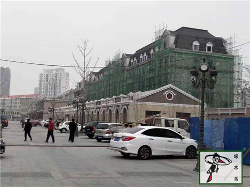 啄木鳥漆與鼎威地產(chǎn)達(dá)成合作-成功簽約開灤路商業(yè)街外墻翻新工程項目